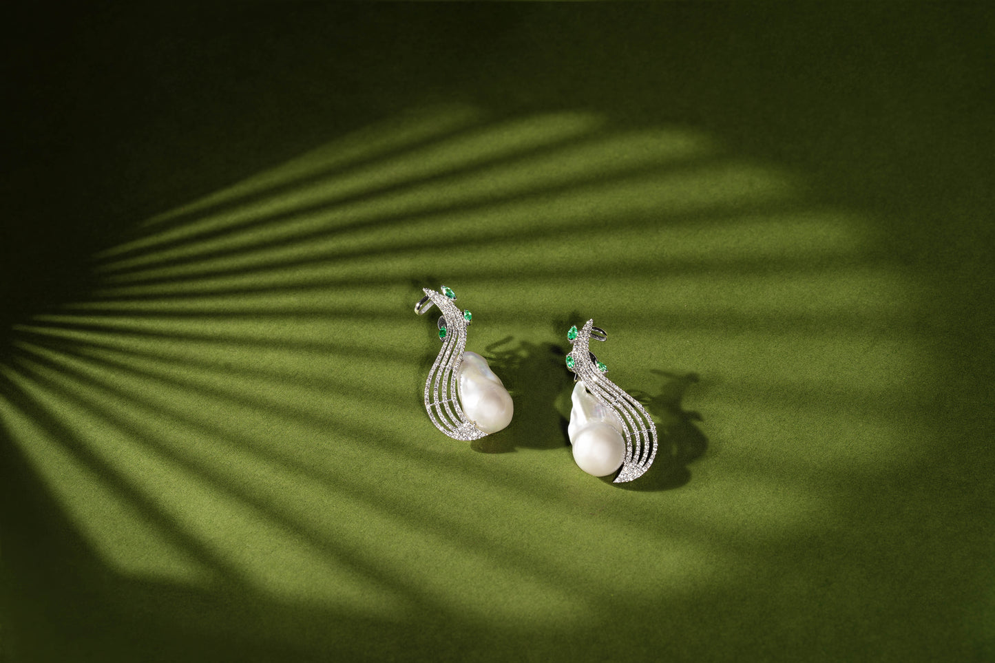 Fusion of Pearls and Emeralds in a Pair of Exquisite Earrings