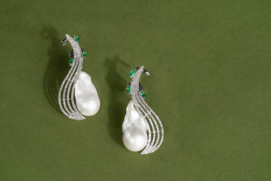 Fusion of Pearls and Emeralds in a Pair of Exquisite Earrings