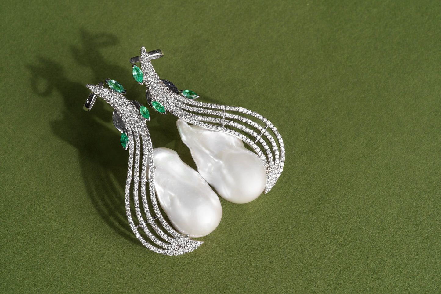 Fusion of Pearls and Emeralds in a Pair of Exquisite Earrings